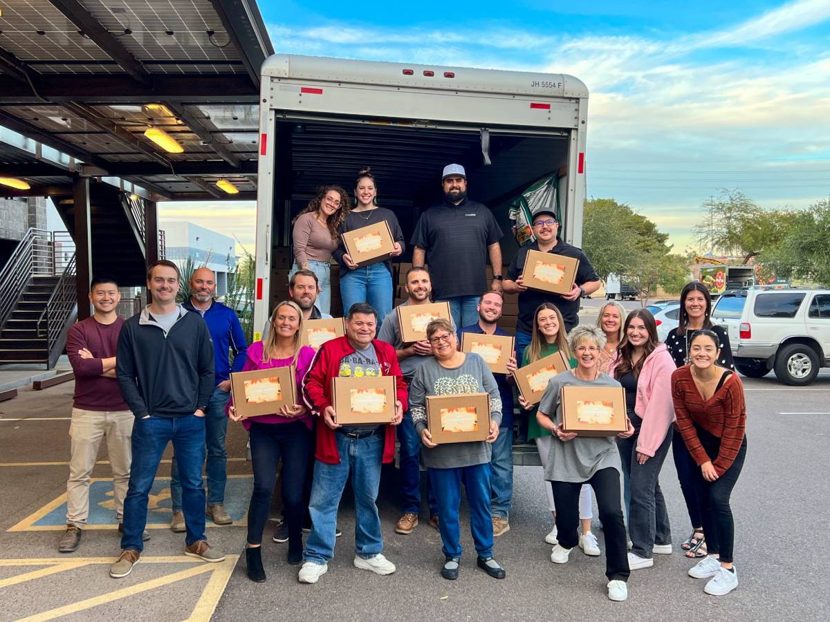 CHASSE Building Team Celebrates Annual CHASSE-Giving by Assembling 1,000 Holiday Meal Boxes for Local School Districts