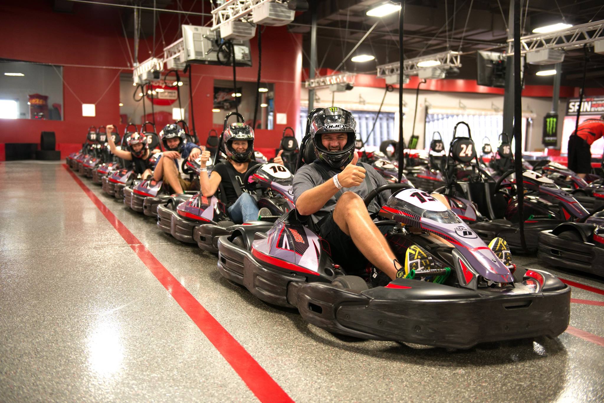 A family racing in go karts