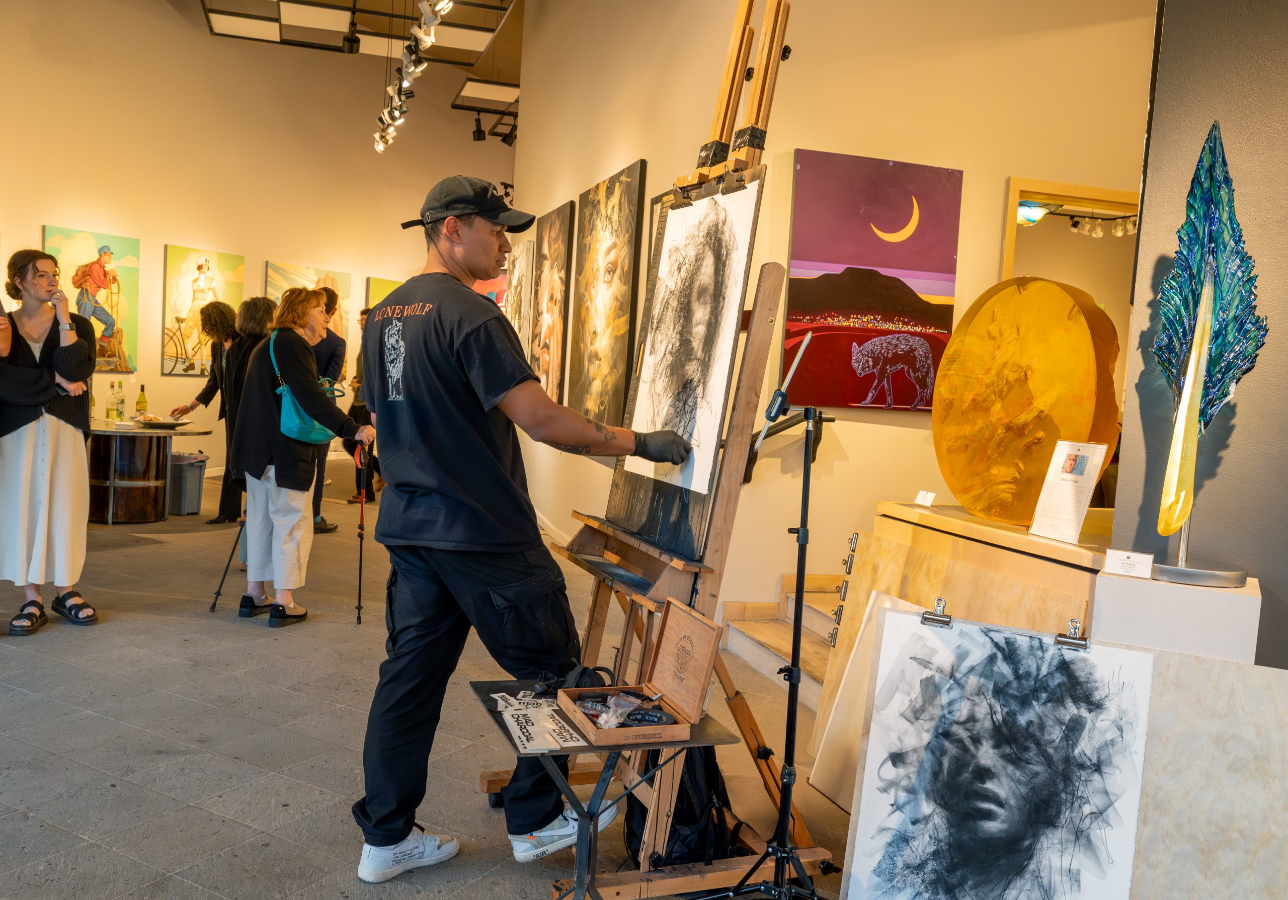 There are often live artist demonstrations, like this one at The Marshall Gallery, during the weekly Scottsdale ArtWalk in Downtown Scottsdale's Arts District. Photo by Analisa Shah for Experience Scottsdale