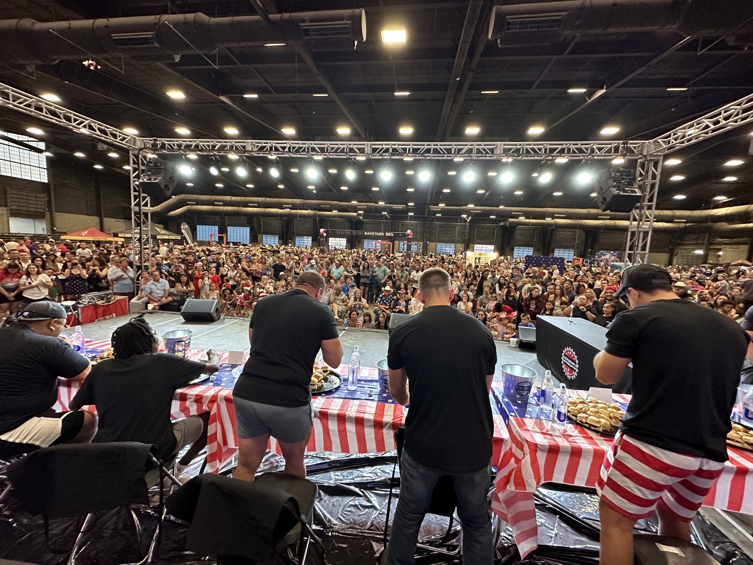 Participants at the Cold Beers & Cheeseburgers Summer Slider Eating Contest